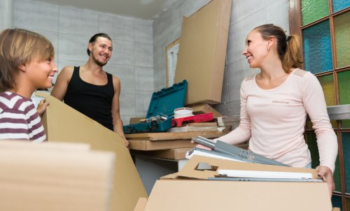 Same day removals team handling urgent moving boxes in South Kensington
