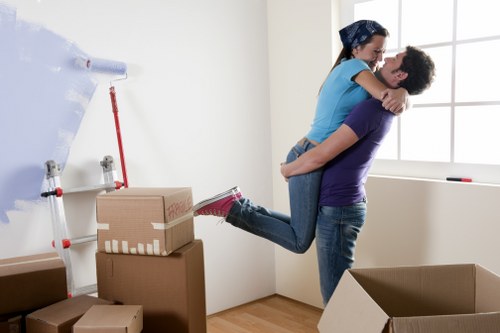 Moving van and removal crew handling a home relocation in South Kensington
