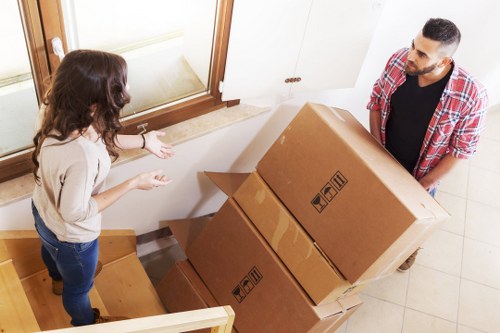 Loading furniture carefully into a van for transport in South Kensington