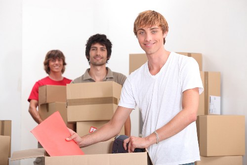Packed moving boxes ready for transport in South Kensington
