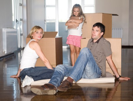 Packed moving boxes ready for a home removal service in South Kensington