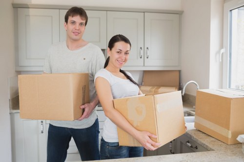 Professional movers handling office furniture during a South Kensington relocation